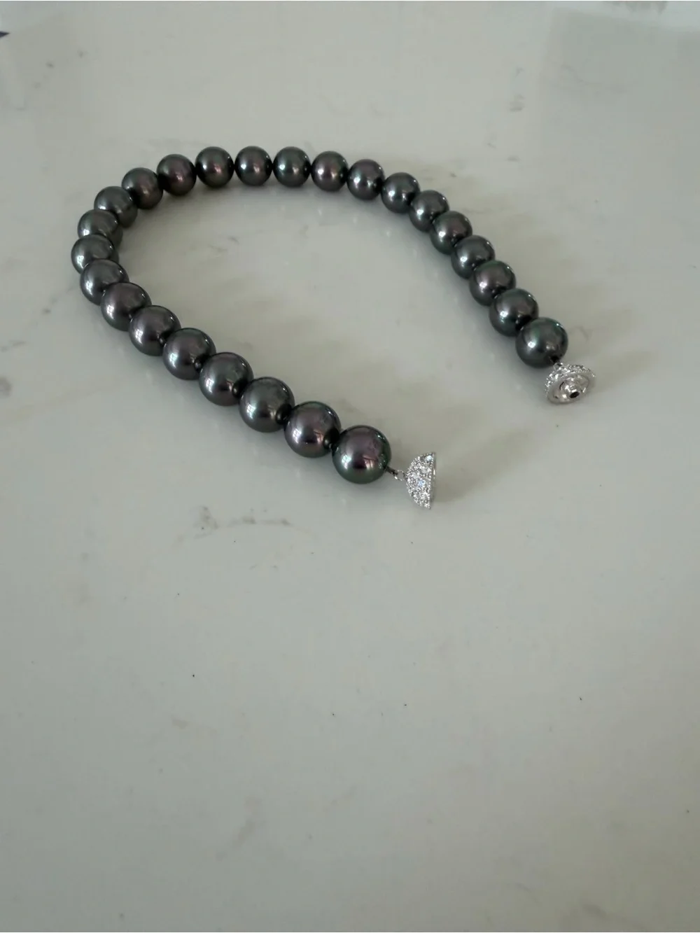 Lustrous Dark Charcoal Pearlescent Bead Necklace with Pavé Crystal Clasp